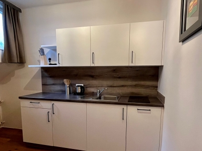 Einzelzimmer Premium Küche.jpeg